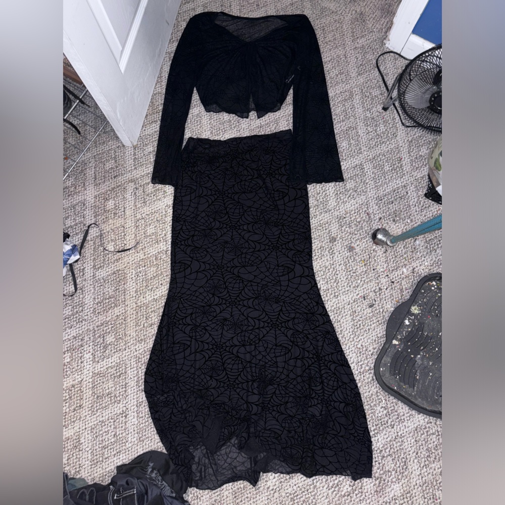 both top to small on arms and skirt to small on waste